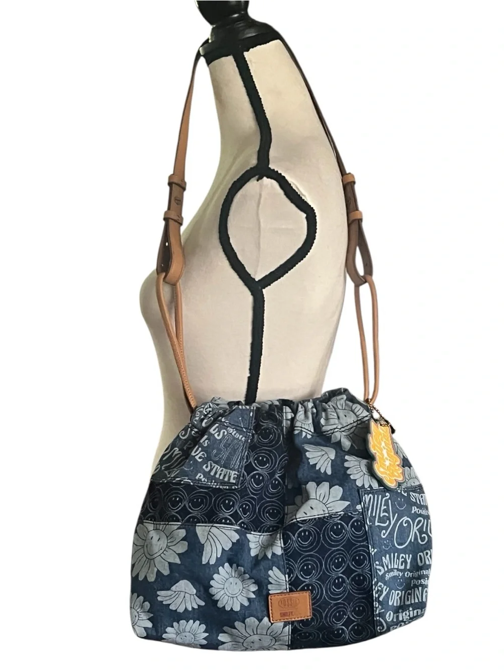 Fossil x Smiley limited edition patchwork denim drawstring shoulder bag.